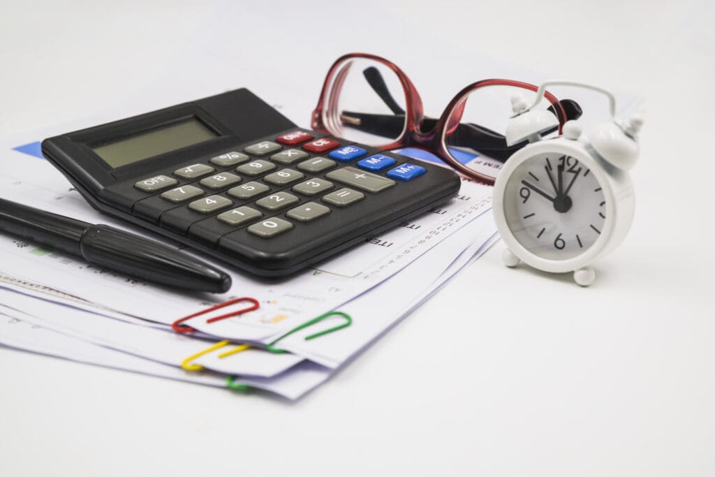 Resolved IT | IT Services for Accounting & Finance firms office supplies papers with glasses